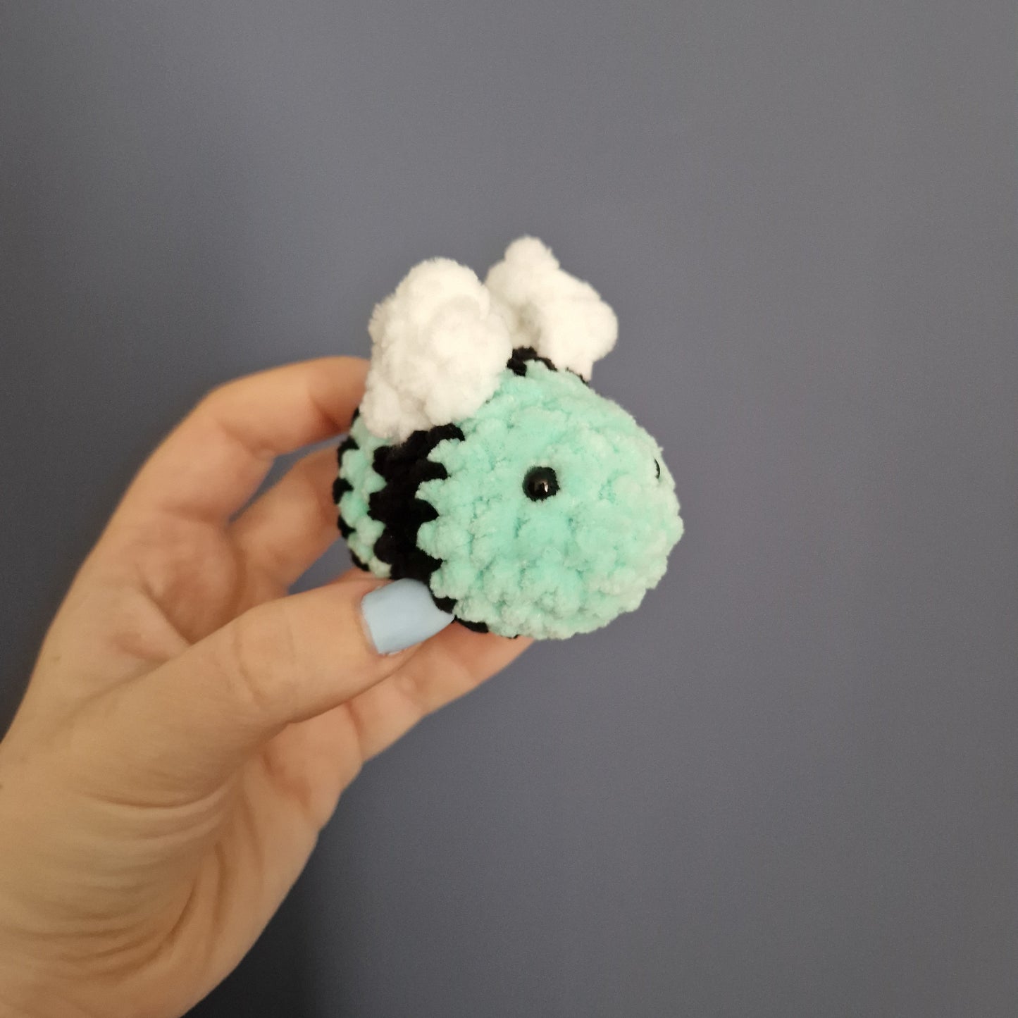 Mint green coloured chunky crochet bee keyring