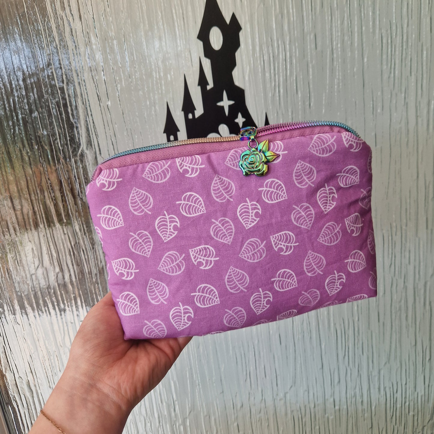 Animal Crossing leaf lined triangle pouch with rose zipper pull