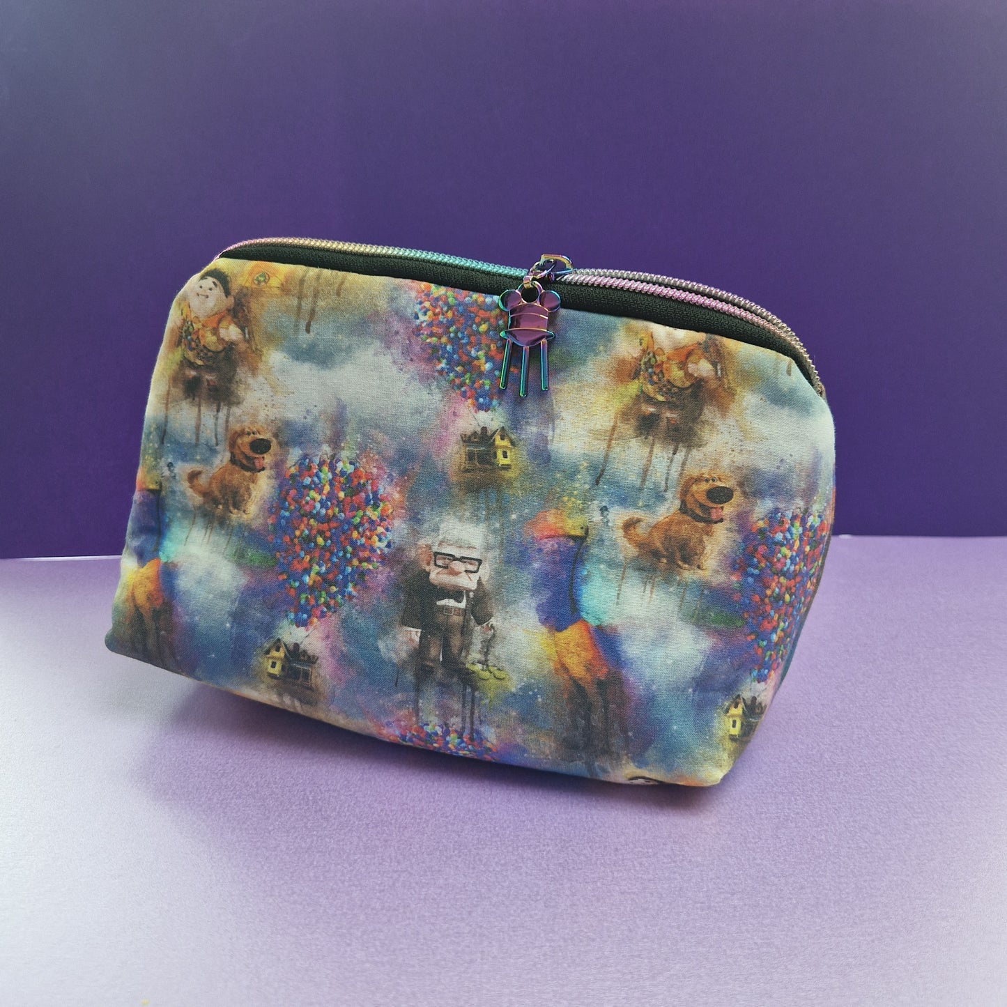 Wilderness Explorer lined triangle cosmetic bag with water tower zipper pull