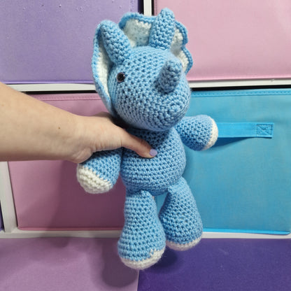 Blue and grey crochet dinosaur