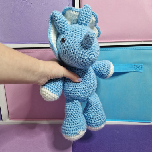 Blue and grey crochet dinosaur