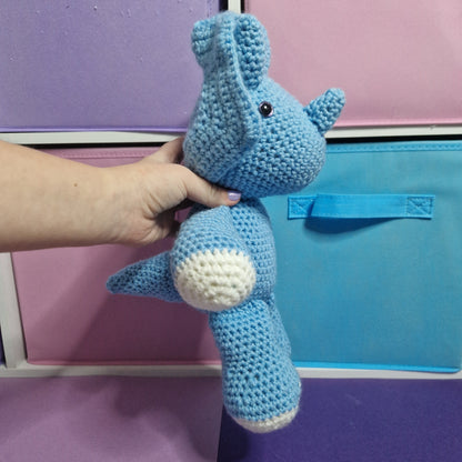 Blue and grey crochet dinosaur