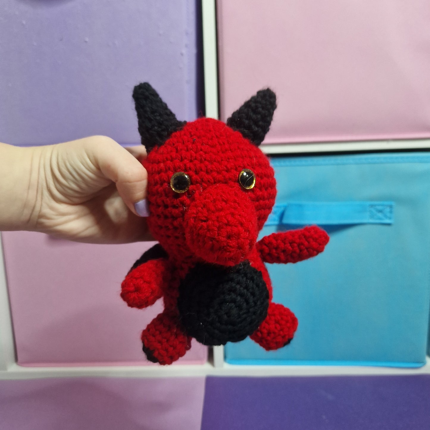 Red crochet dragon