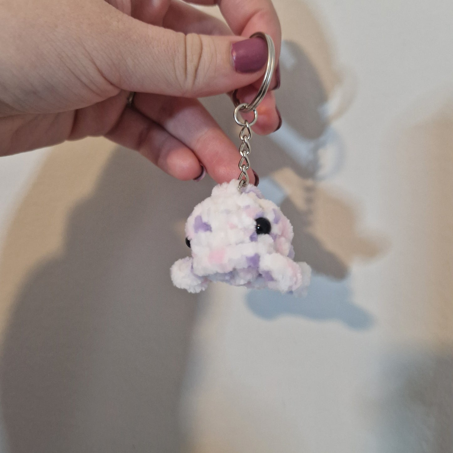 Lilac, white and pink mini whale chenille yarn crochet keyring