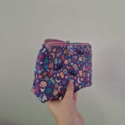 The Lost Princess  themed lined triangle cosmetic bag with matching zipper pull