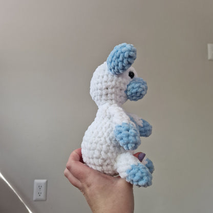 Blue and white sitting cow crochet plushie