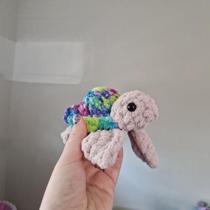 Green, pink, blue variegated sea turtle small crochet plushie