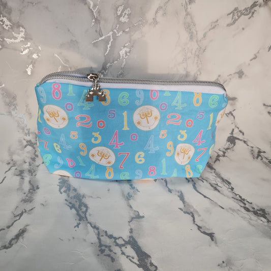 Blue Clock lined triangle cosmetic bag with zipper