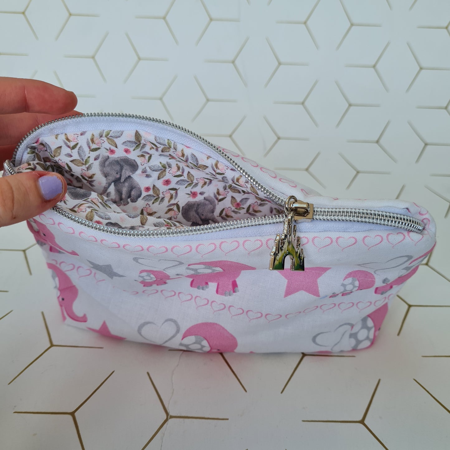 Elephants on Parade lined triangle cosmetic bag with zipper - Flying Elephant